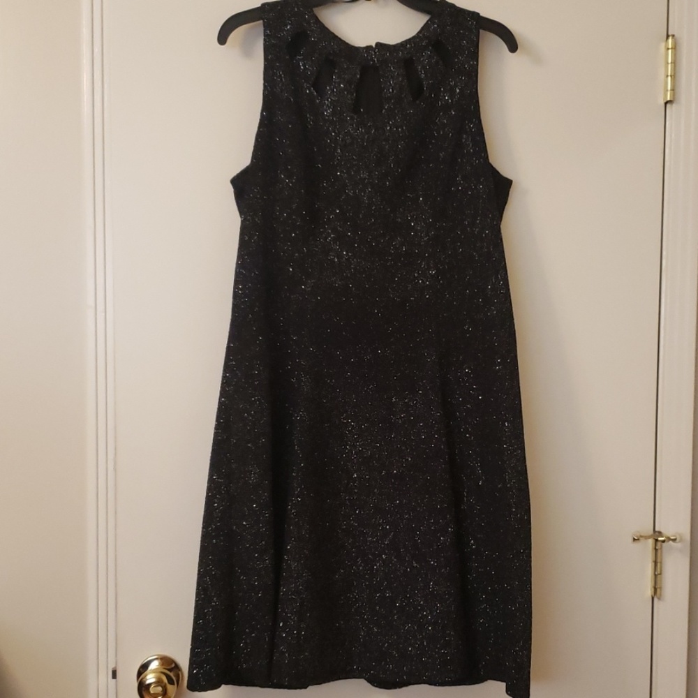 Fit and flare black cocktail dress.